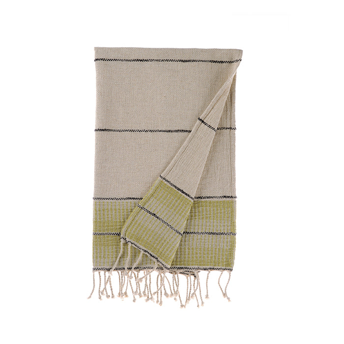 Towel with green and beige pattern on a white background