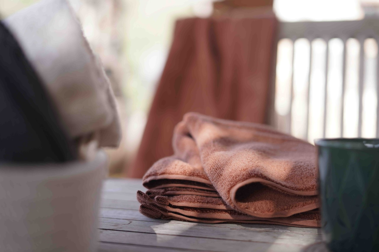 Brown towel on a table with a blurred background