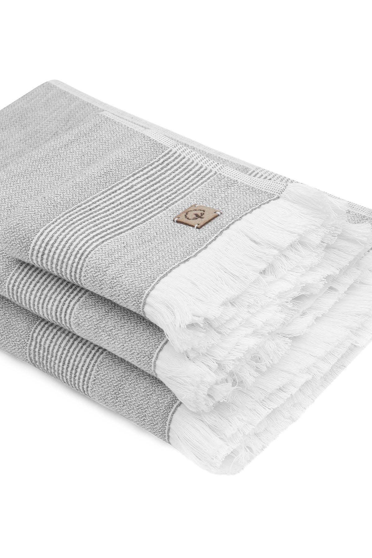 Gray and white towel with a brand logo on a white background