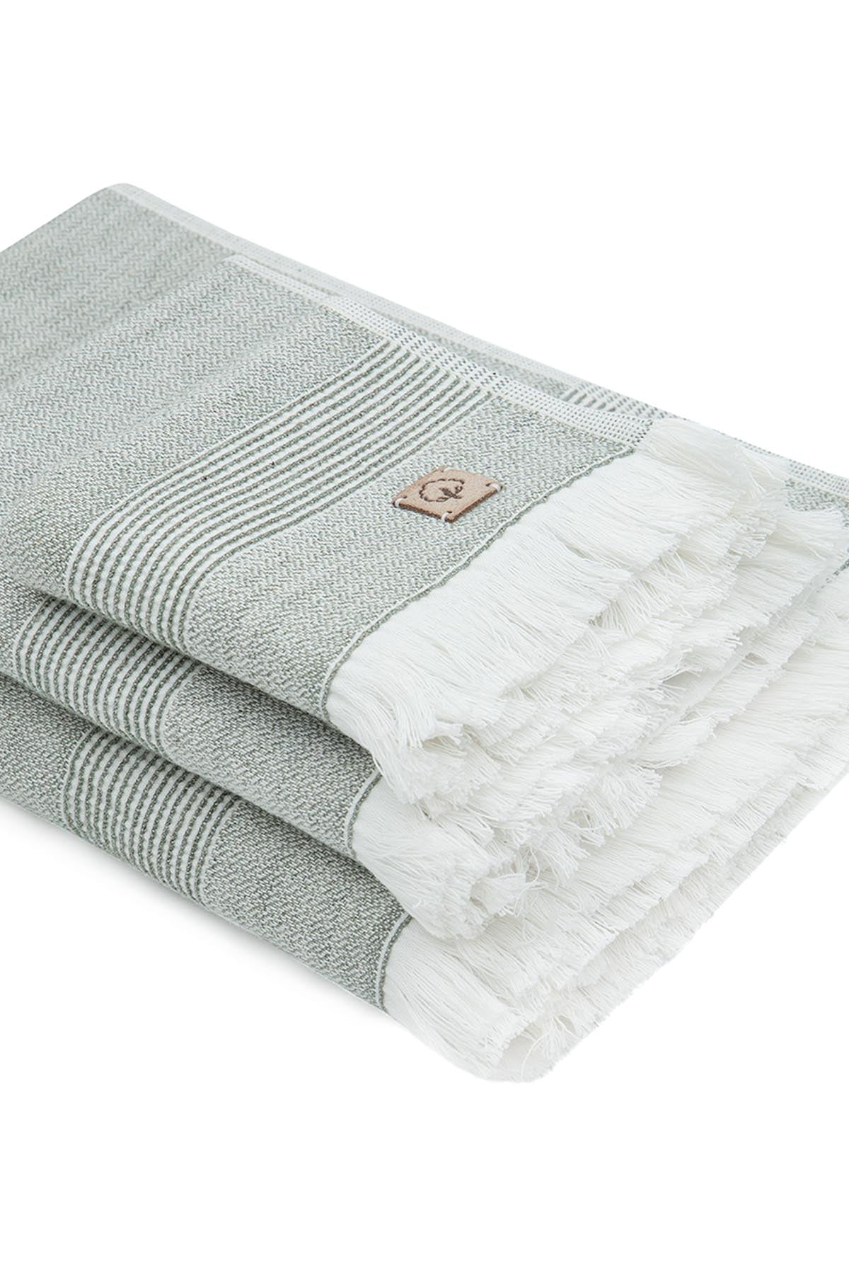 Gray and white towel with a brand logo on a white background