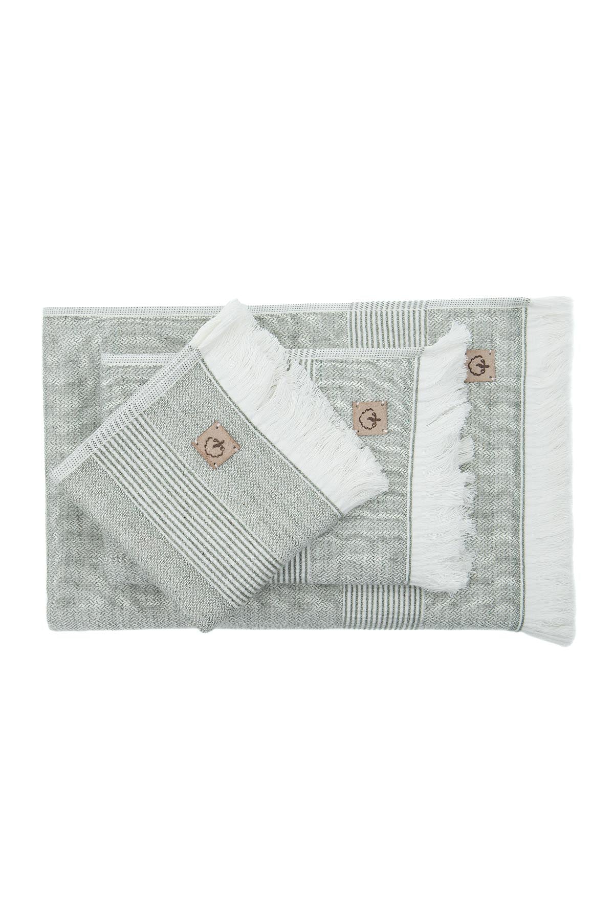 Top view of the three-piece Hasna Organic Aegean Cotton and Linen Bath Set in Pine Breeze, displaying the layout, texture, and natural tones of each towel
