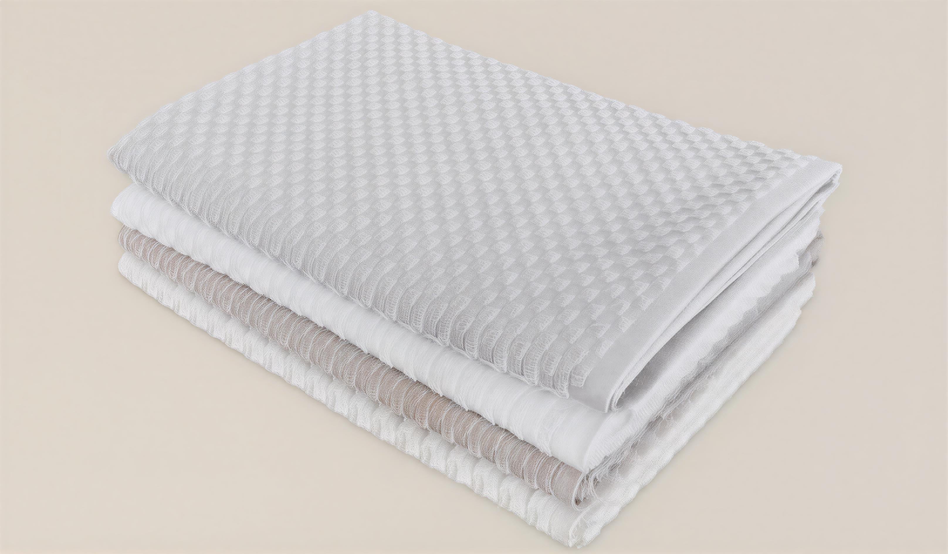 Re&Up 250-GSM Cotton Towel with a checker pattern, an organic cotton towel made from 75% pure cotton and 25% recycled cotton fibres, offering a quick-dry, sustainable option for your bathroom