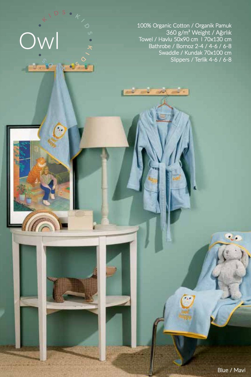 Children's bath set featuring a cute blue owl pattern on towel, bathrobe, and slippers, designed for comfort and a whimsical touch