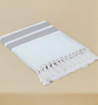 Green Mai Beach Towel with Flat Weave Face and Full Terry Loop Back with Knotted Fringe