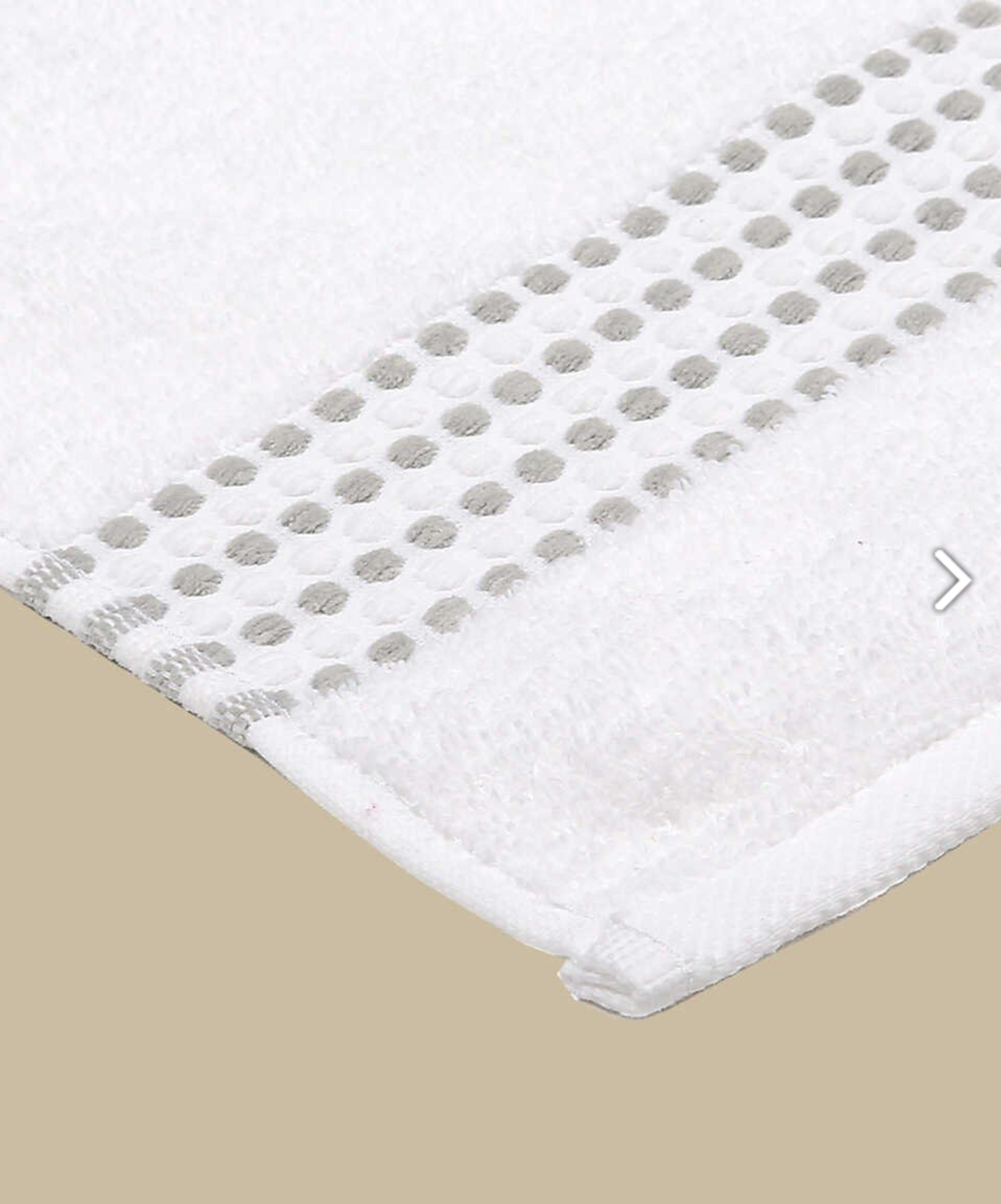 Close-up classy 460-GSM Cotton/Viscose Towel in white, an organic cotton towel offering a soft, luxurious feel with excellent absorbency and a crisp, fresh look