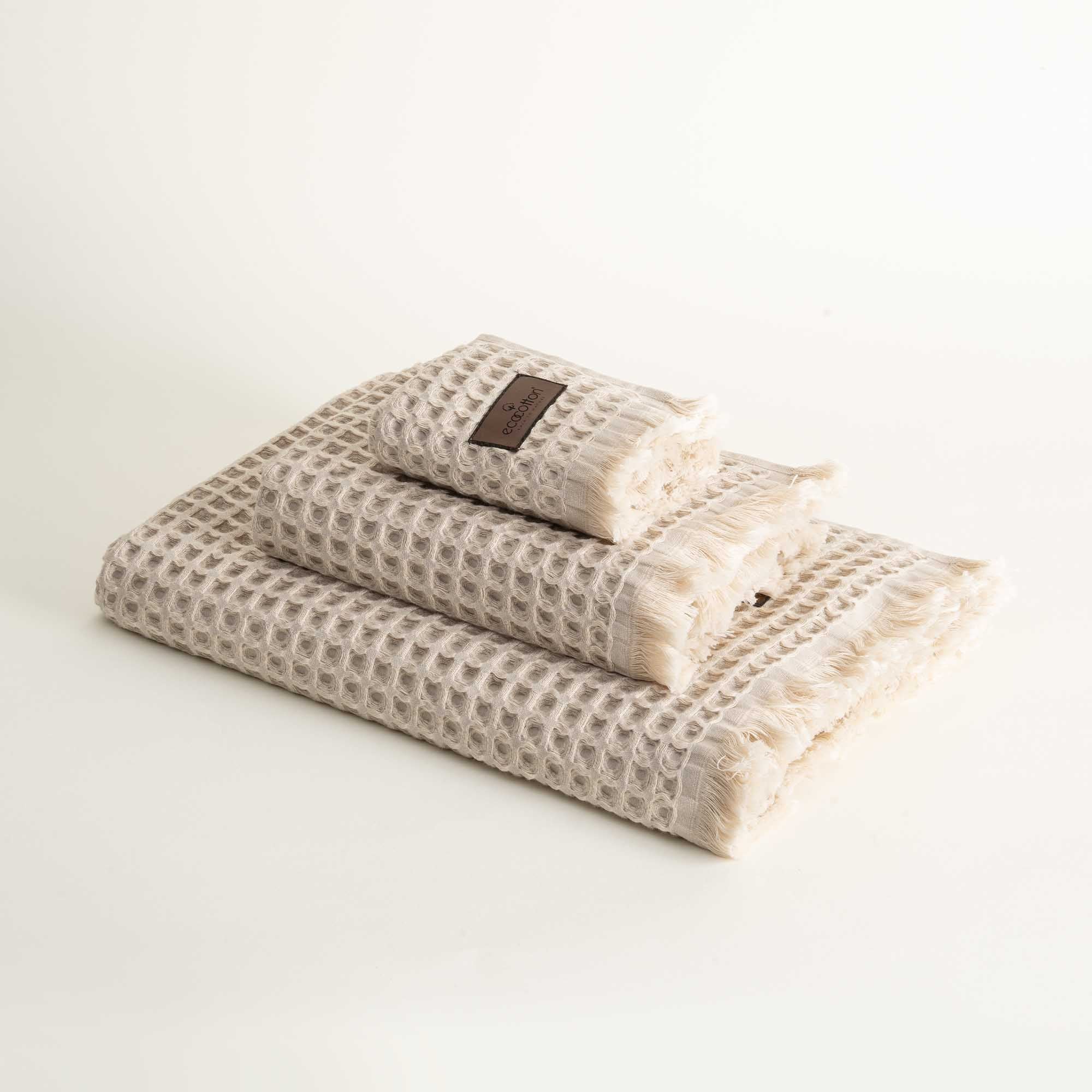 Yummy Vanilla Seren organic cotton waffle luxury bath towel set including hand and washcloth towels, highlighting soft texture and sustainable luxury