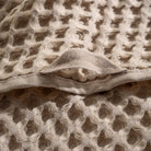 Close-up of Yummy Vanilla Seren Organic Cotton Waffle Bath Set, showing the soft texture and luxurious waffle weave design