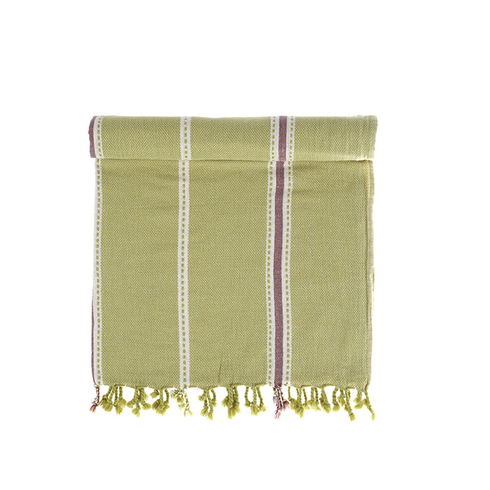 Green towel with striped pattern and fringes on a white background