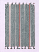 A rectangular woven towel with fringe tassels on both ends, featuring a muted sage green base with vertical stripes in white and terracotta red.