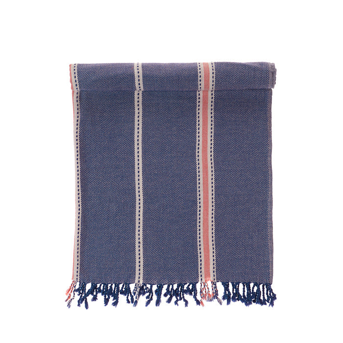 Blue towel with pink stripes on a white background