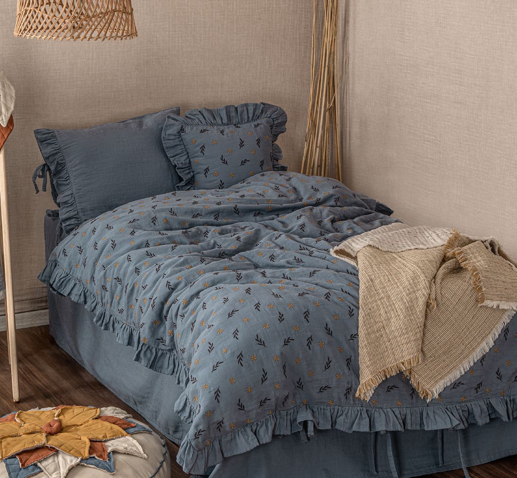 Muslin Duvet Cover Set in navy blue made with organic sheets.