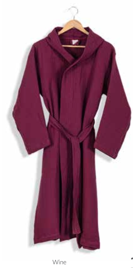 Deep burgundy hooded bathrobe made from sustainable Aegean cotton, designed with a relaxed fit and waist tie—luxurious eco-friendly loungewear for spa, hotel, or home comfort.