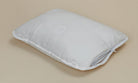 Soft organic cotton pillow with a side zipper by Minoa Home, made with organic sheets, ideal for adjustable comfort and hypoallergenic support.