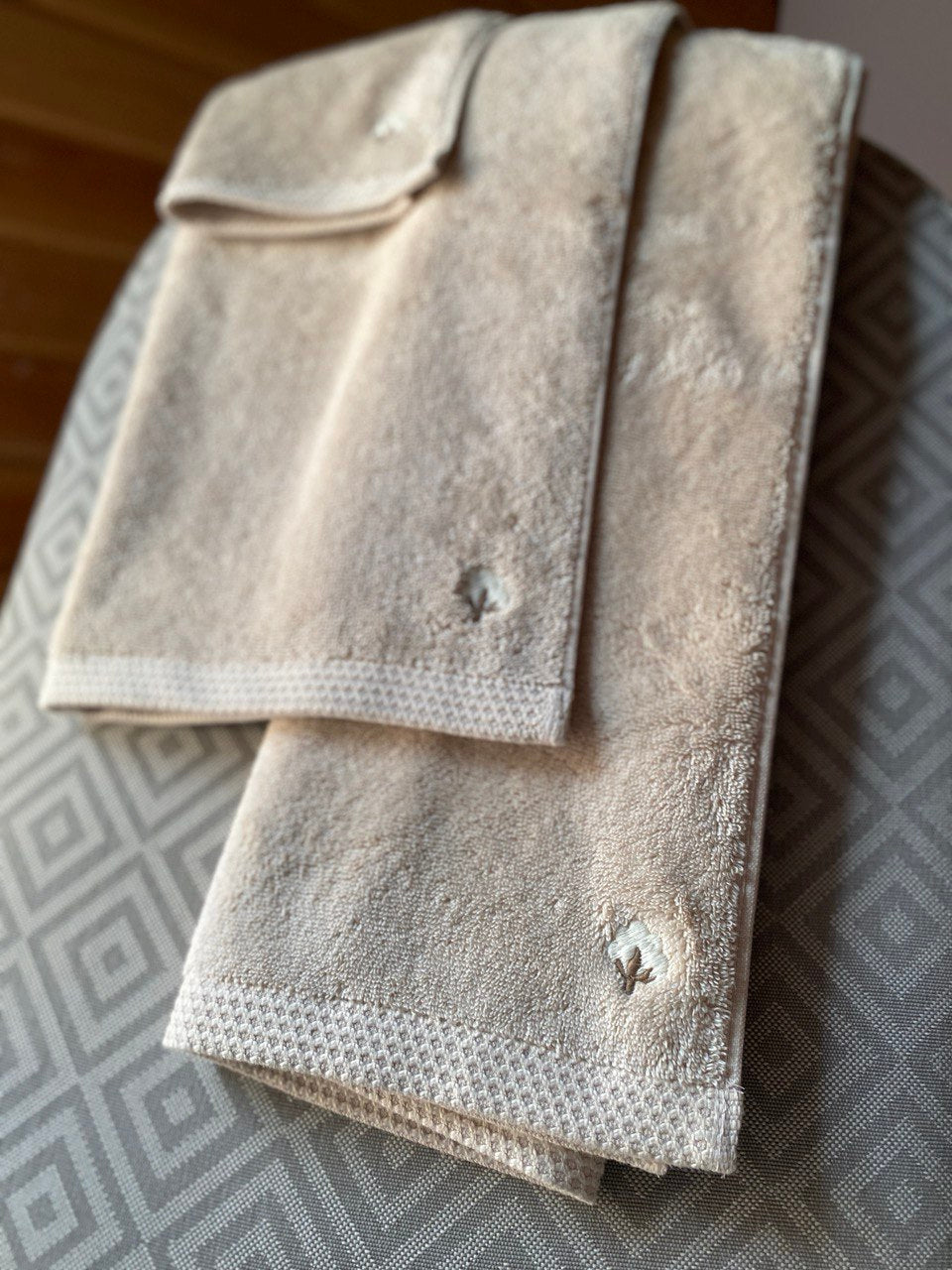 Close-up of Minoa USA Canada Jasper organic Aegean cotton luxury bath towel set, highlighting soft plush texture, elegant design, and sustainable luxury